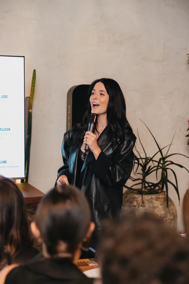 Speaker presenting at a Bulletpitch event